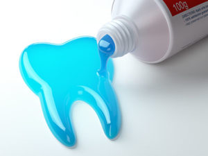 Toothpaste pours out of the tube into the shape of a tooth, reminding viewers of the importance of fluoride treatments in TX