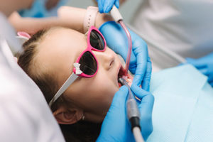 young child receiving dental services from the Houston Sedation Dentist