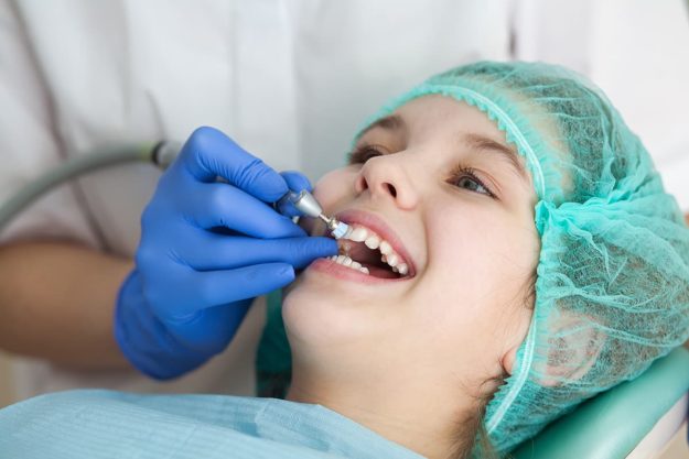 a woman getting the benefits of fluoride
